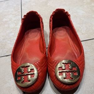 Orange quilted flats